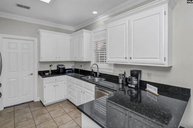 kitchen with light tile patterned floors, sink, white cabinetry, dishwasher, and ornamental molding