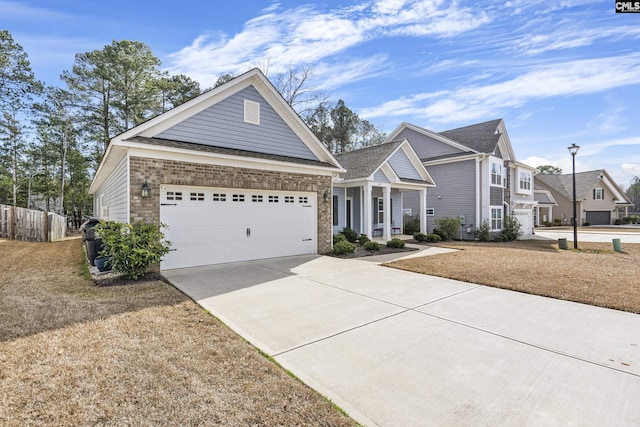 view of front facade featuring a front yard and a garage