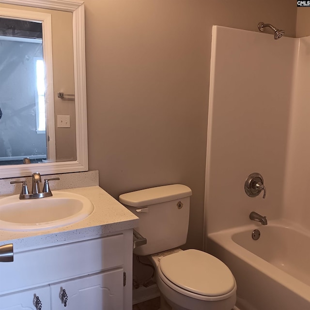 full bathroom featuring vanity, toilet, and bathtub / shower combination