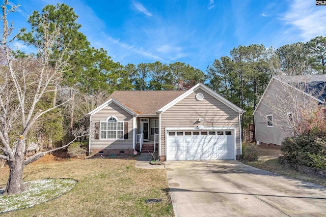 view of front of house featuring a front lawn and a garage