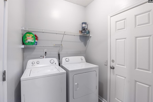 laundry area featuring washer and clothes dryer