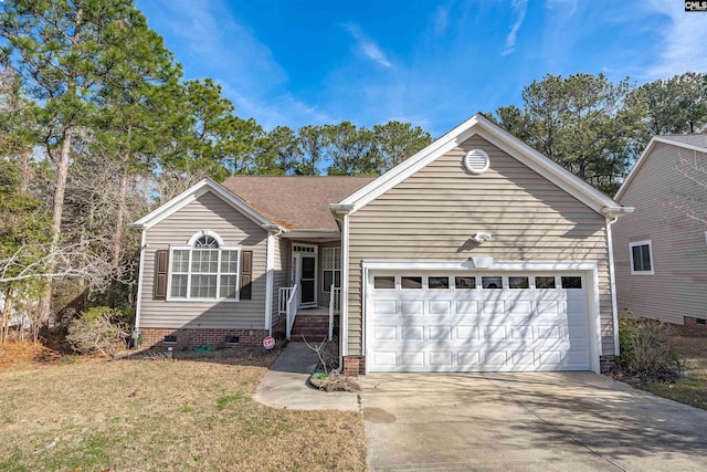 view of front of house with a front yard and a garage