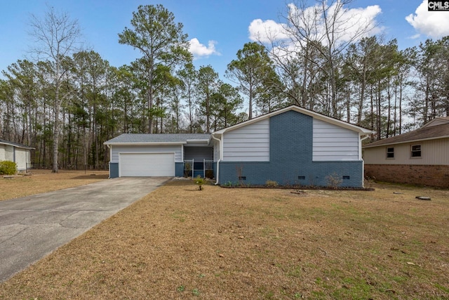 view of front facade with a front yard and a garage