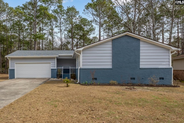 ranch-style house with a front yard and a garage