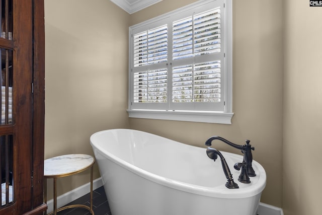 345 Amstar Rd, Columbia, SC 29212 - bathroom featuring baseboards, a soaking tub, and crown molding
