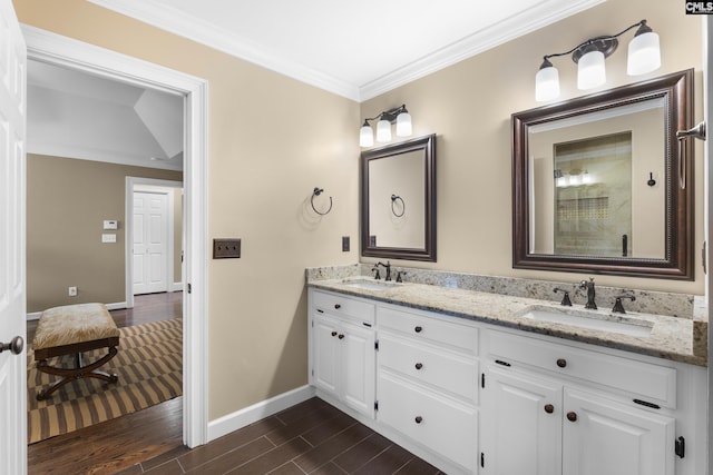 345 Amstar Rd, Columbia, SC 29212 - full bath featuring crown molding, baseboards, wood tiled floor, double vanity, and a sink