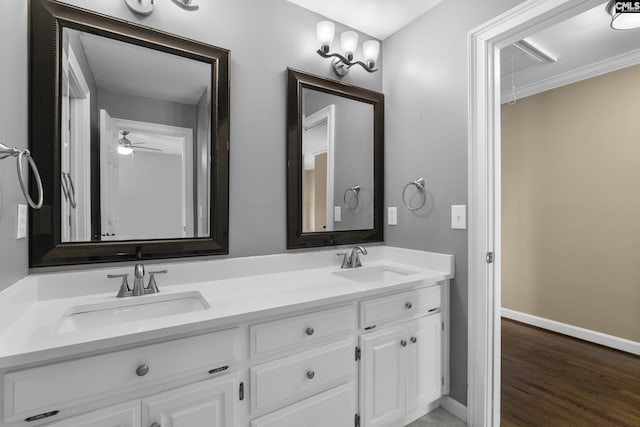 345 Amstar Rd, Columbia, SC 29212 - full bathroom featuring double vanity, baseboards, wood finished floors, and a ceiling fan