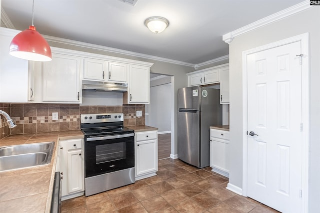 kitchen featuring under cabinet range hood, appliances with stainless steel finishes, white cabinets, and a sink