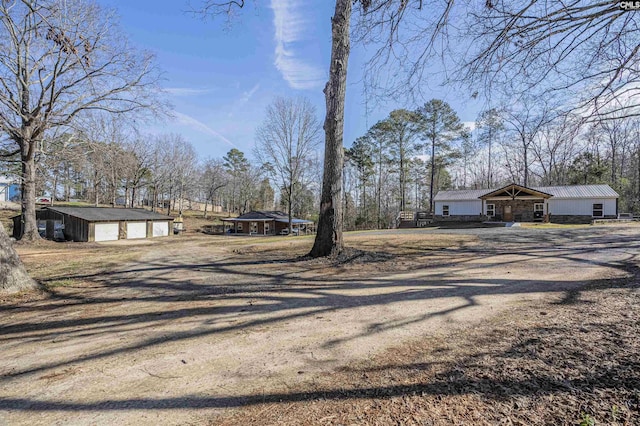 view of road with driveway