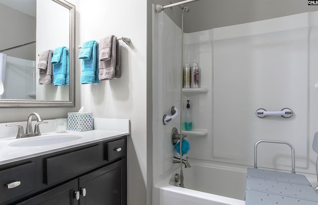 bathroom with bathtub / shower combination and vanity