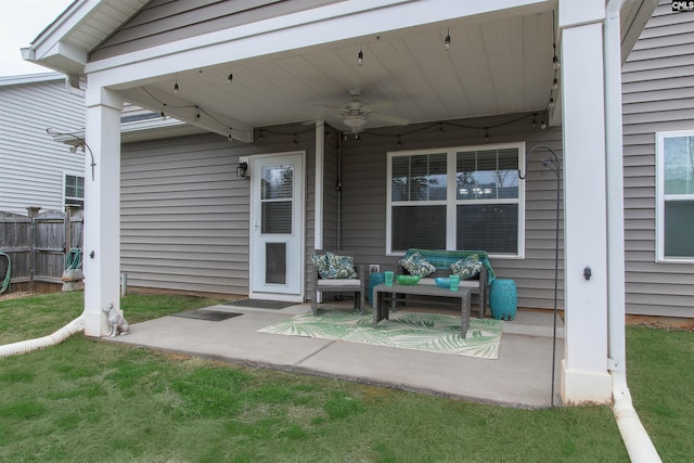 view of patio / terrace featuring ceiling fan and fence