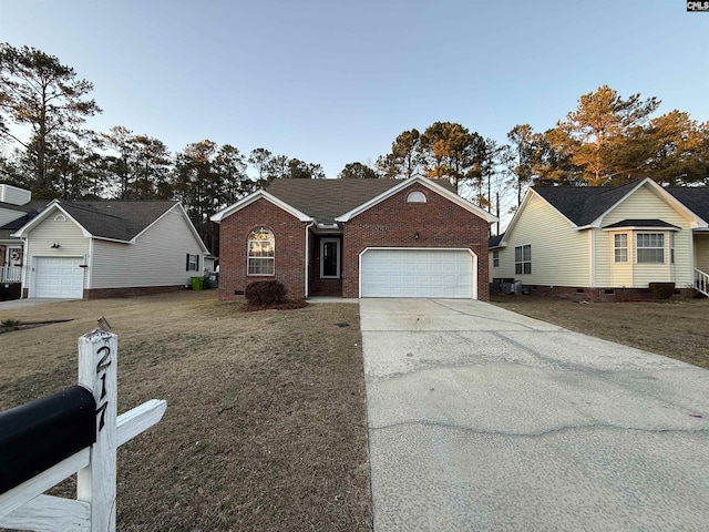 ranch-style home with brick siding, concrete driveway, fence, a garage, and a front lawn