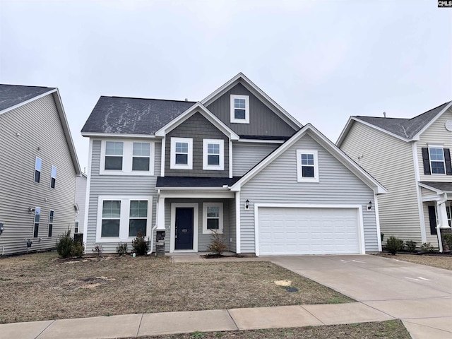 view of front of home featuring board and batten siding and concrete driveway