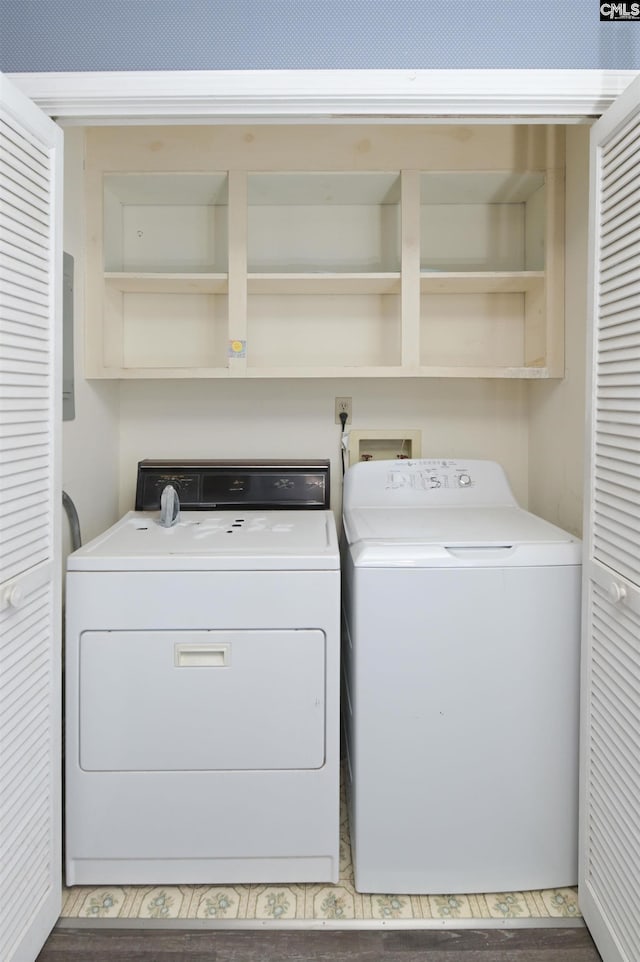 washroom featuring laundry area and washing machine and clothes dryer