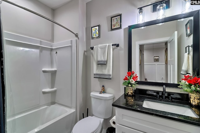 full bath featuring washtub / shower combination, vanity, and toilet