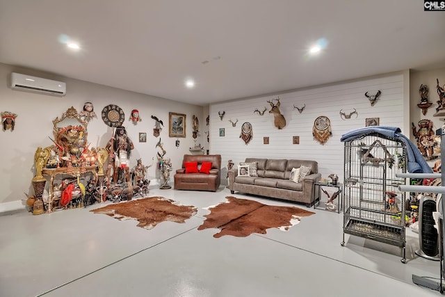 interior space featuring recessed lighting, a wall unit AC, and concrete floors