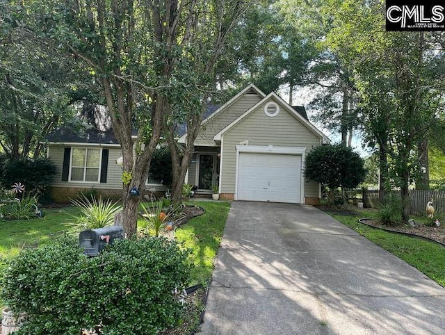 ranch-style house with an attached garage, driveway, and fence