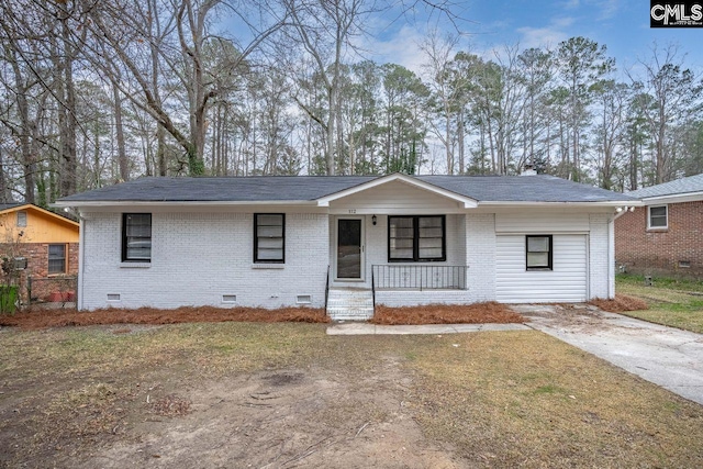 ranch-style home featuring a shingled roof, a porch, crawl space, a front lawn, and brick siding