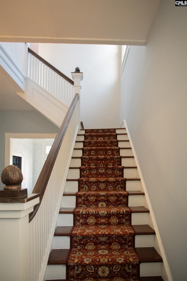 staircase with a healthy amount of sunlight