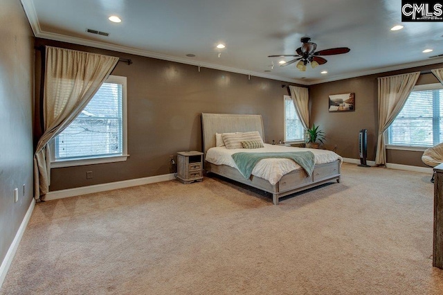 bedroom with light carpet, baseboards, visible vents, and ornamental molding