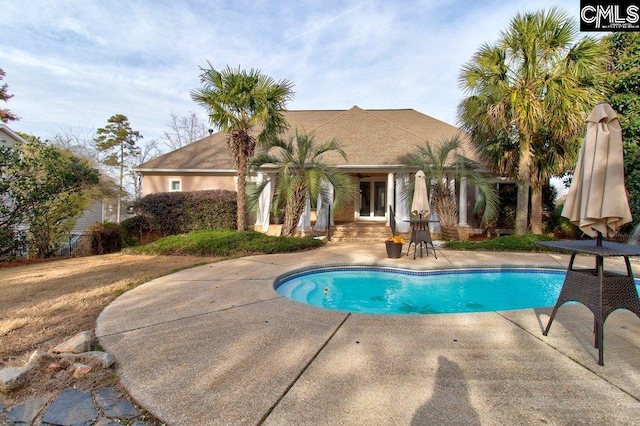 pool featuring a patio area