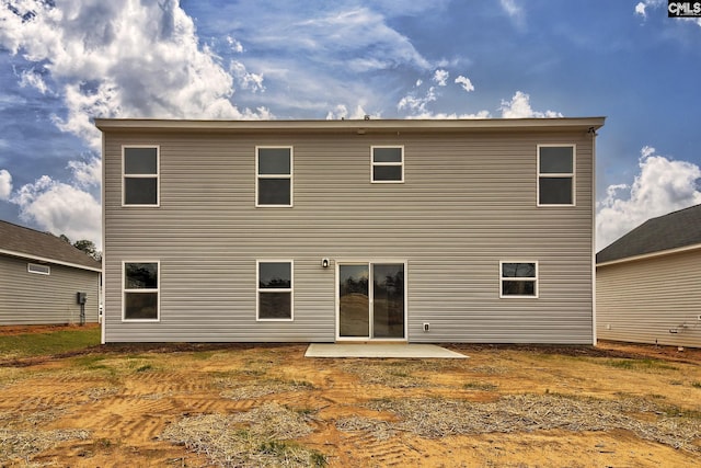 rear view of house featuring a patio