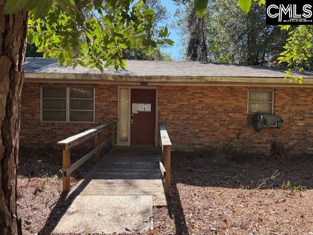 view of front of property with brick siding