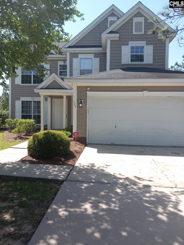 view of front of house featuring a garage and driveway