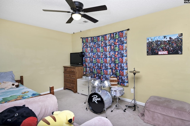 bedroom with light carpet, baseboards, visible vents, ceiling fan, and a textured ceiling