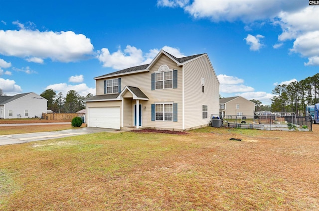 traditional-style house featuring a garage, concrete driveway, a front lawn, and fence