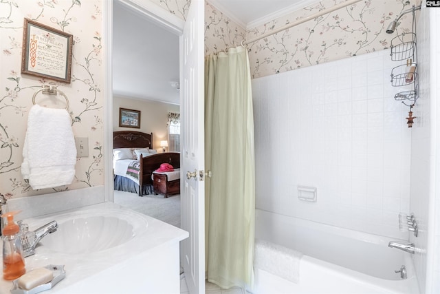 bathroom featuring shower / bath combination with curtain, crown molding, ensuite bathroom, and wallpapered walls