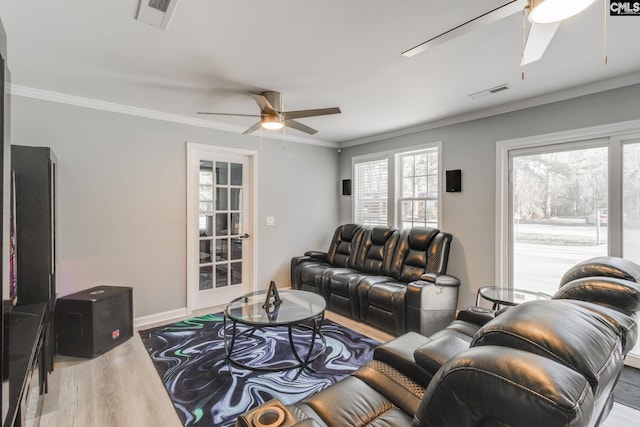 307 Wyoming Dr, Sumter, SC 29153 - living area featuring wood finished floors, visible vents, baseboards, a ceiling fan, and ornamental molding