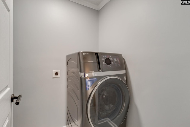 307 Wyoming Dr, Sumter, SC 29153 - clothes washing area with laundry area, washer / clothes dryer, and ornamental molding