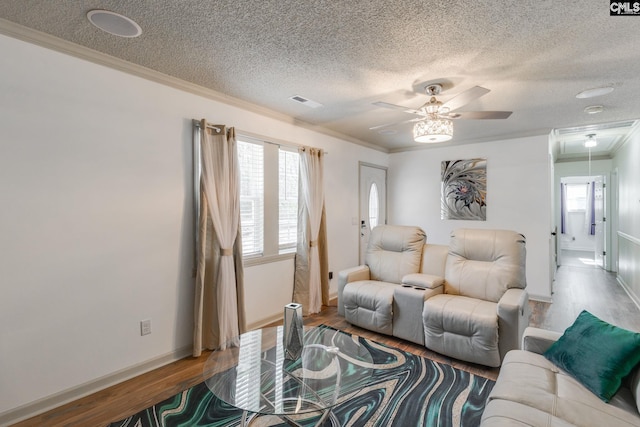 307 Wyoming Dr, Sumter, SC 29153 - living room with attic access, ornamental molding, and wood finished floors