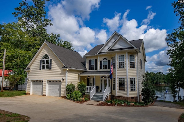 view of front facade featuring crawl space, a garage, a porch, and concrete driveway