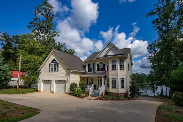 view of front of property featuring a porch, an attached garage, fence, concrete driveway, and crawl space