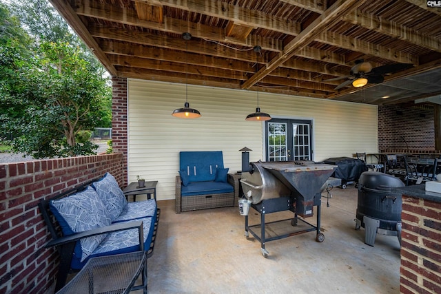 view of patio / terrace with outdoor lounge area and a ceiling fan