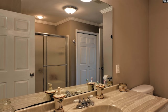 full bathroom with a closet, an enclosed shower, vanity, and crown molding