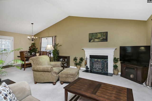 carpeted living room with lofted ceiling, a fireplace, and a chandelier