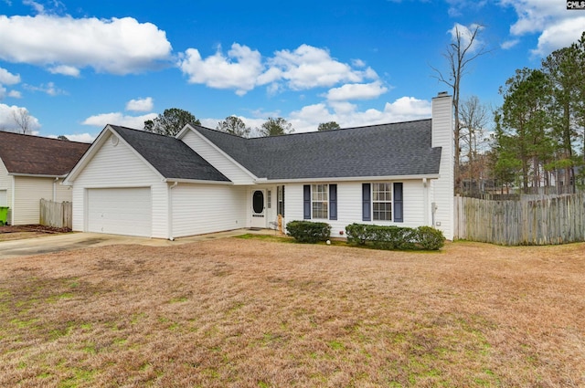 single story home with a garage, a chimney, a front yard, and fence