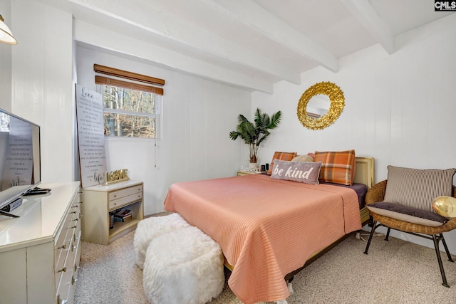 bedroom featuring beam ceiling