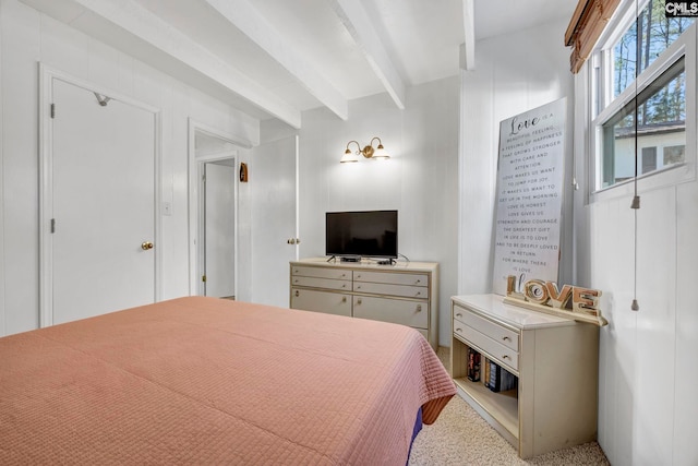 bedroom with beamed ceiling