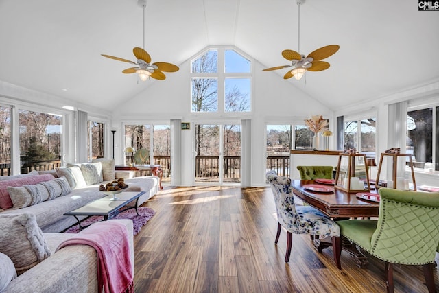 sunroom / solarium featuring vaulted ceiling and a ceiling fan