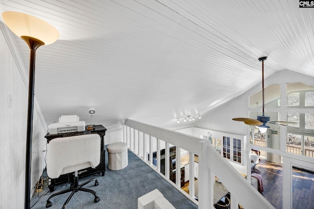 office area with vaulted ceiling and wood finished floors