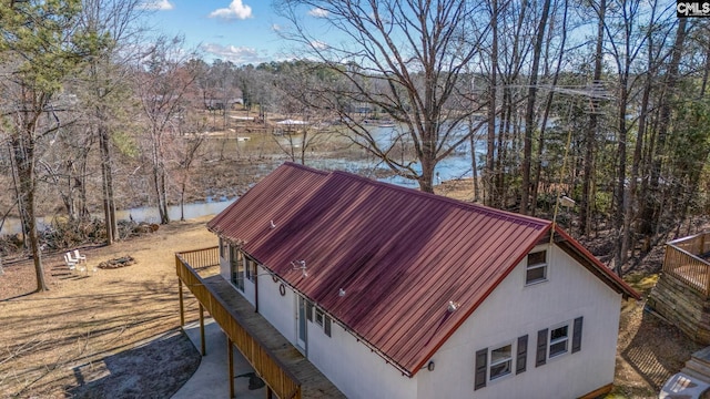 exterior space with a water view