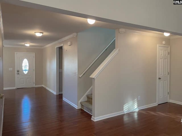 entryway with baseboards, stairs, ornamental molding, and dark wood finished floors