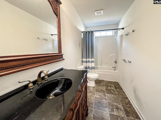 full bathroom with shower / bath combo, vanity, toilet, and baseboards