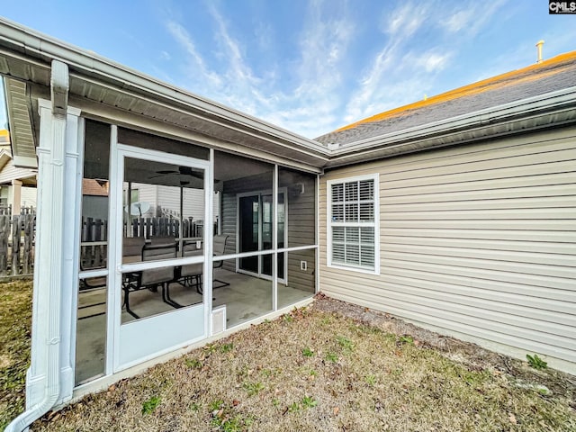 exterior space featuring a sunroom