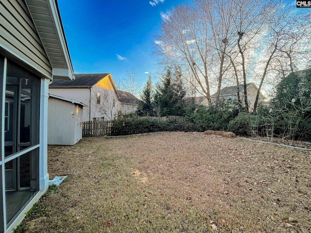 view of yard with fence