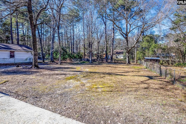 view of yard featuring fence